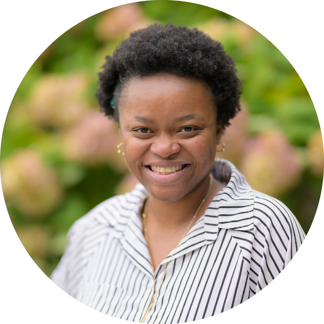 Woman smiling for camera.