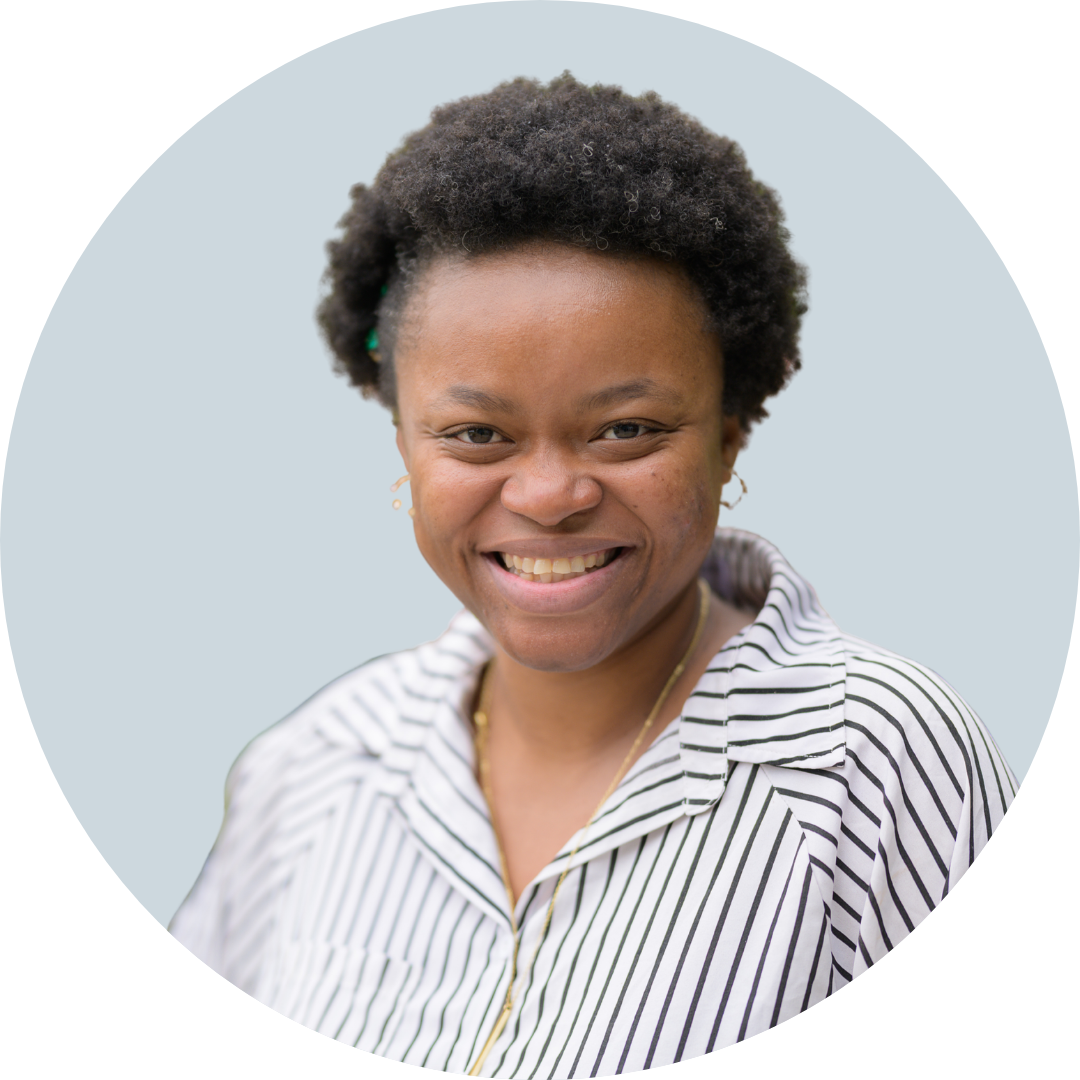 Woman smiling for camera.